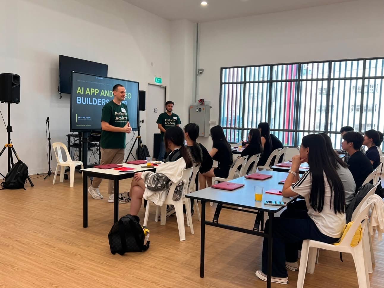 Pathwise instructors leading a workshop for young learners